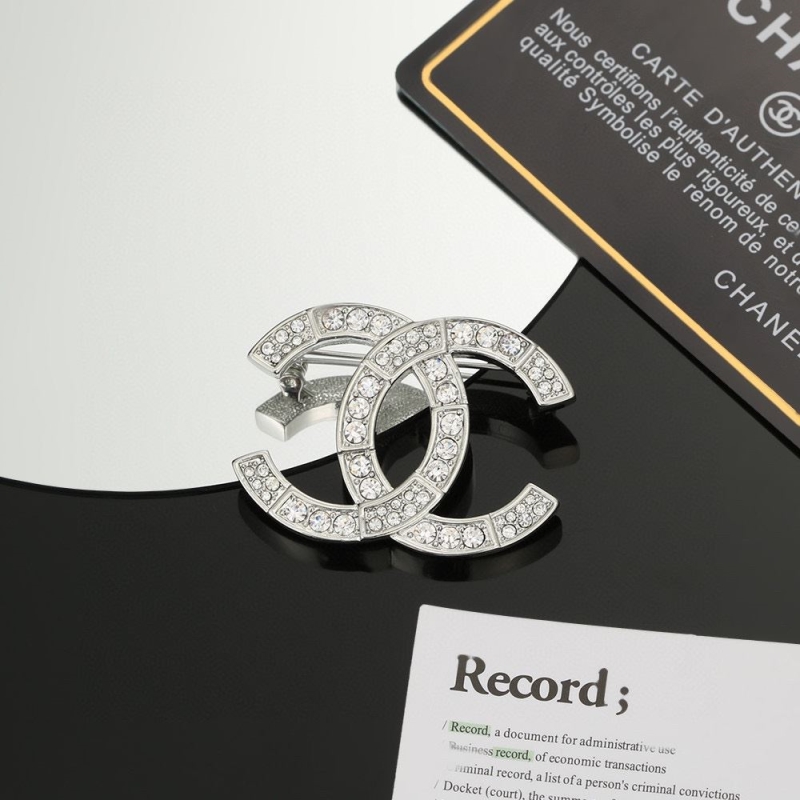 Ch**el brooches